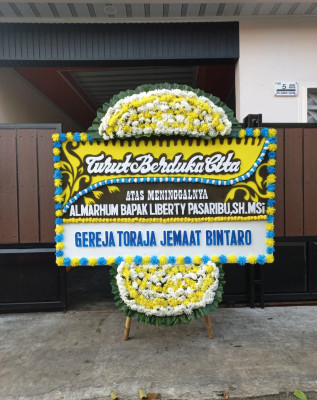 Papan Bunga Duka di Jayamekar